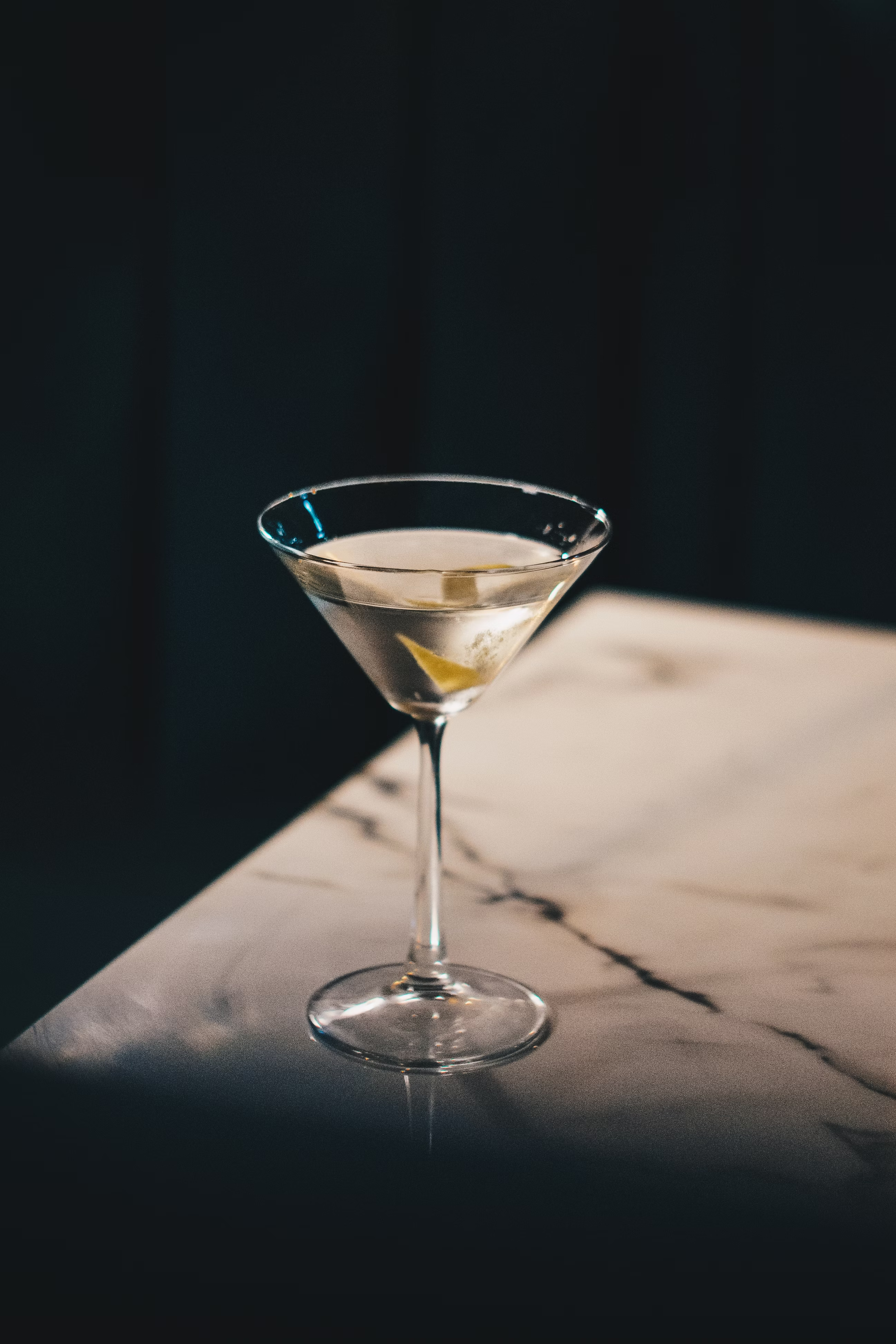 A floral cocktail in a martini glass